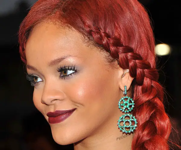 long, wavy and curly hair parted sideways and flowing around