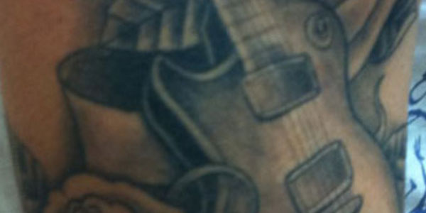 guitar tattoo healed
