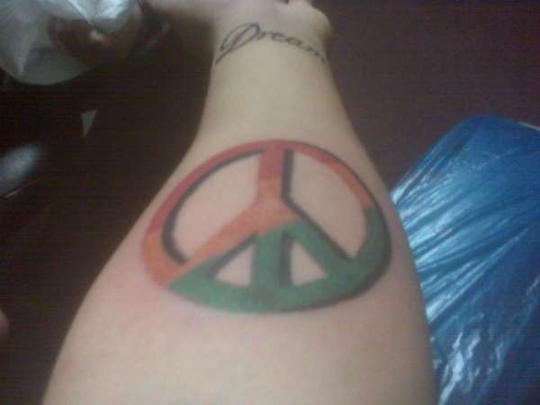 Innner Arm Peace Sign Tattoo