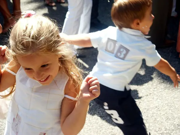 Two Children Playing After A Wedding