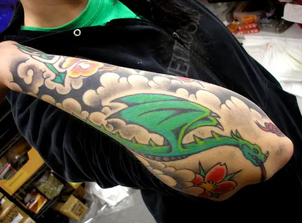 Dragon In Clouds Tattoo