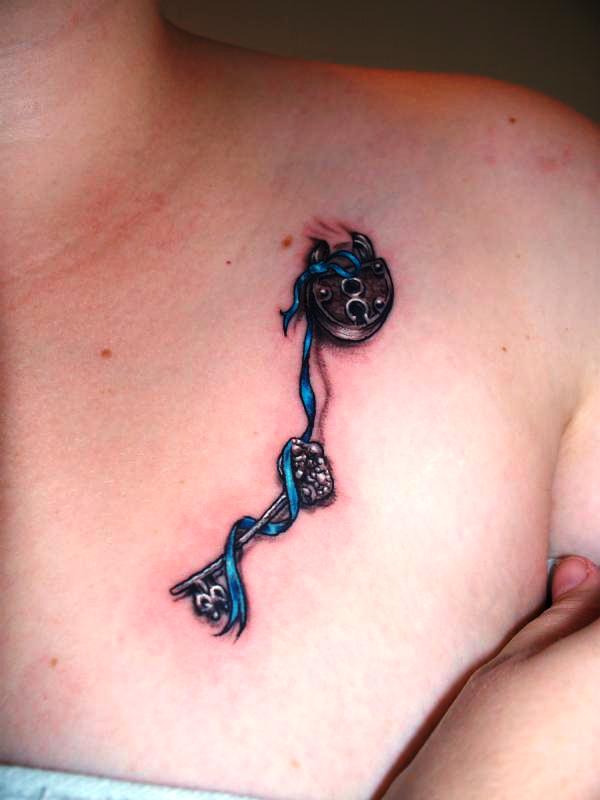 heart lock chest tattoos for women