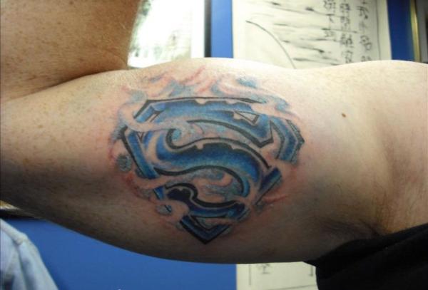 Superman Tattoo On Biceps