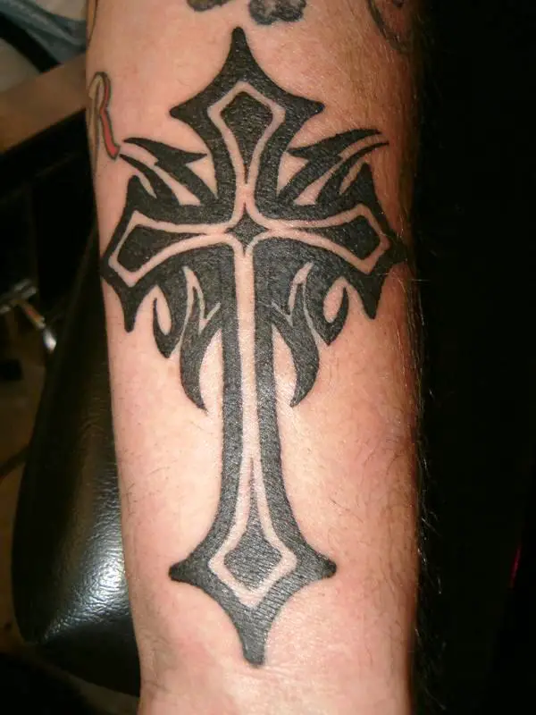 tribal cross tattoos on forearm