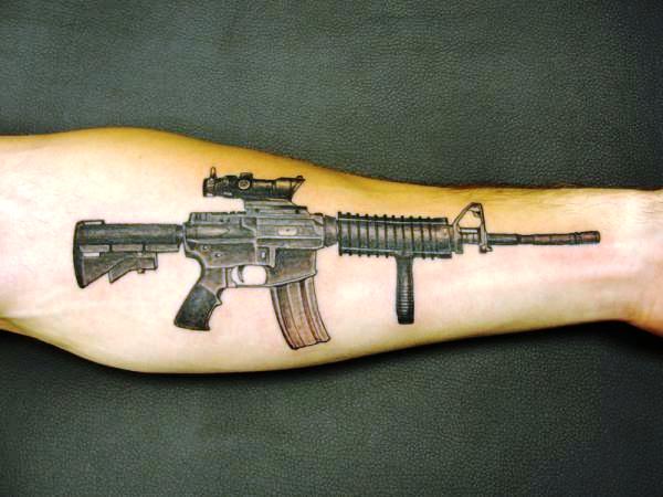 Some of the Best Gun Tattoos Weve Seen  Gunscom