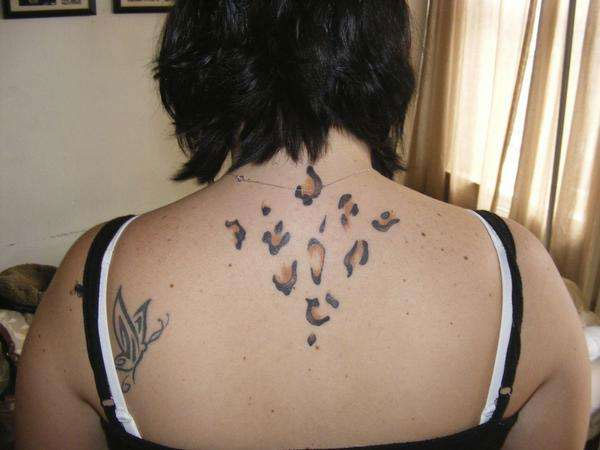 25 Awesome Cheetah Print Tattoo Designs - SloDive