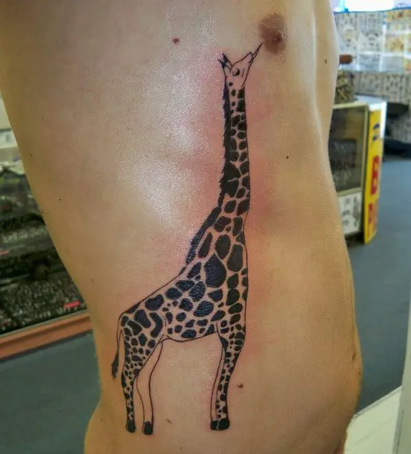 A meaningful rip tattoo idea of a giraffe with banner Grandma  Giraffe  tattoos Small shoulder tattoos Wrist tattoos for guys