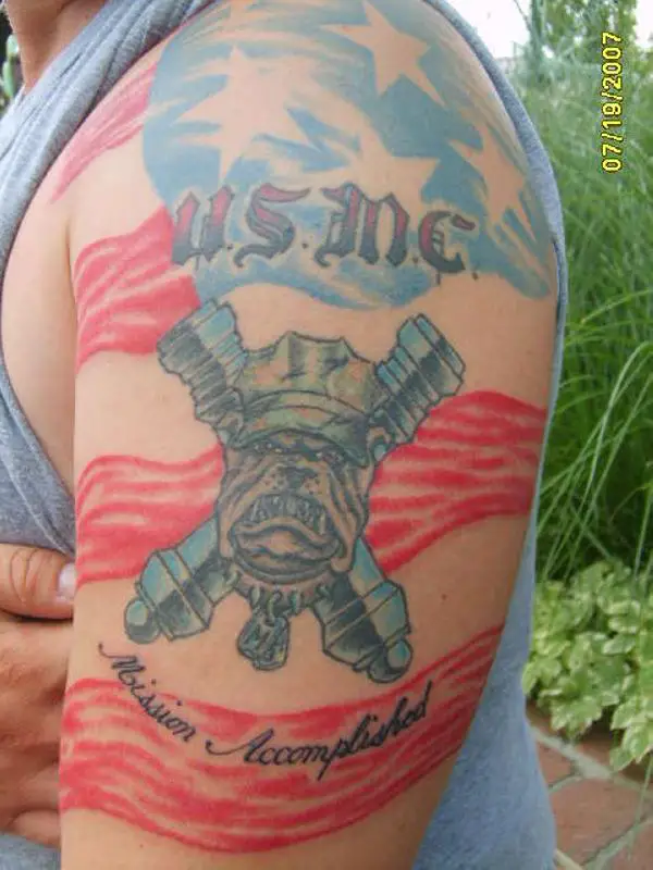 My grandpas marine corp bulldog He got this when he was 17 and had just  finished up at Paris Island He got the tattoo in Jacksonville NC at Camp  Lejeuene in 1958 