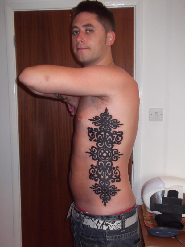 tattoos designs for men on ribs