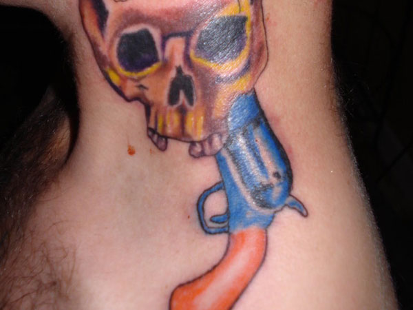 Outlaw Tattoo On Neck