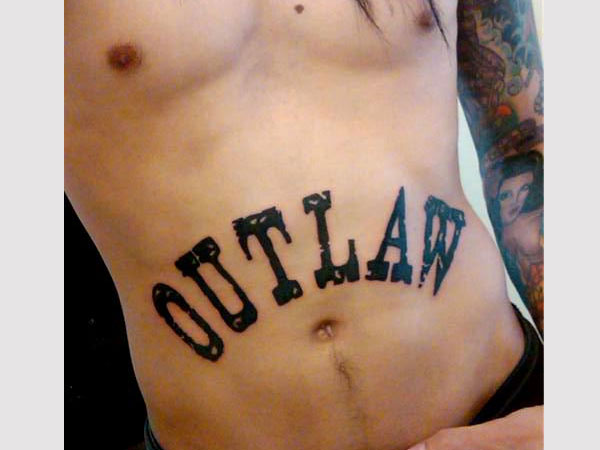 Outlaw Tattoo On Stomach