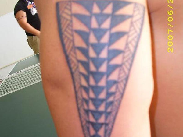 tribal tattoo triangle meaning