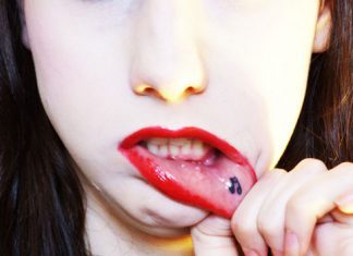 25 Astounding Inner Lip Tattoo Designs