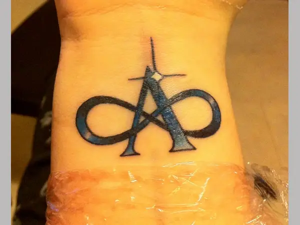 Wrist Symbol Tattoo