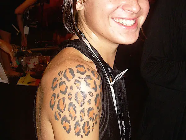 cheetah print tattoo on hip