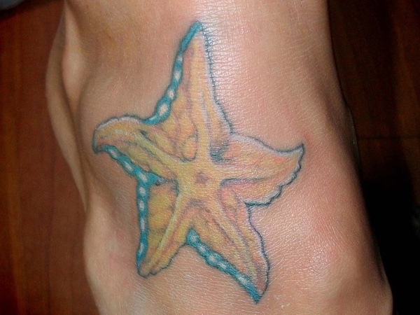 Yellow Star Fish Tattoo