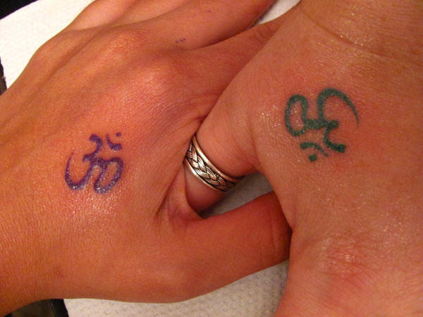 Couple Om Tattoo