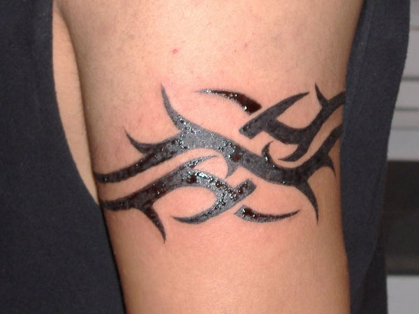 25 Lively Tribal Band Tattoos - SloDive