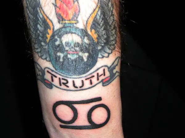 Skull Truth 69 Tattoo