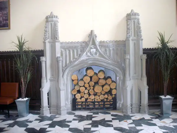 Logs Surround Fireplace