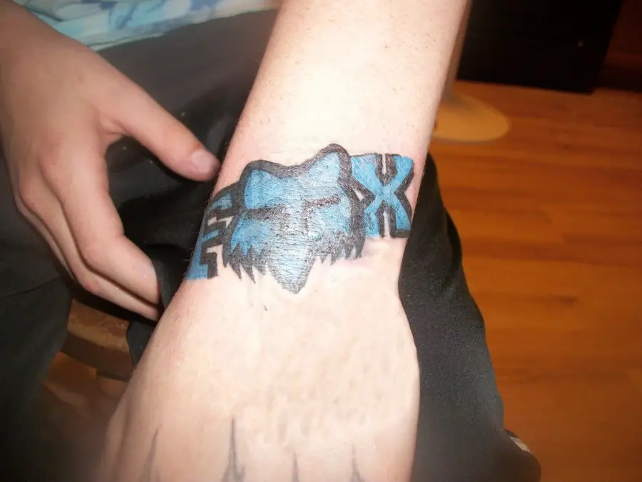 Blue Wrist Fox Racing Tattoo