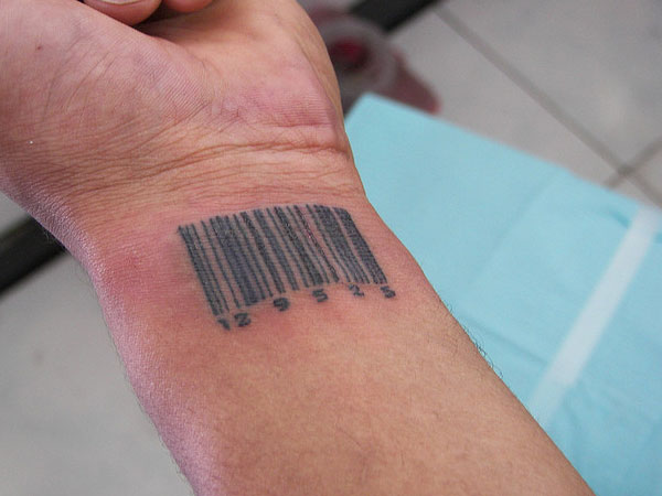 Realistic barcode tattoo on wrist