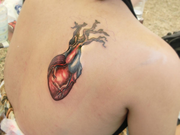 Heart Glow Tattoo
