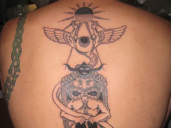 Totem Pole Tattoo in Black Ink