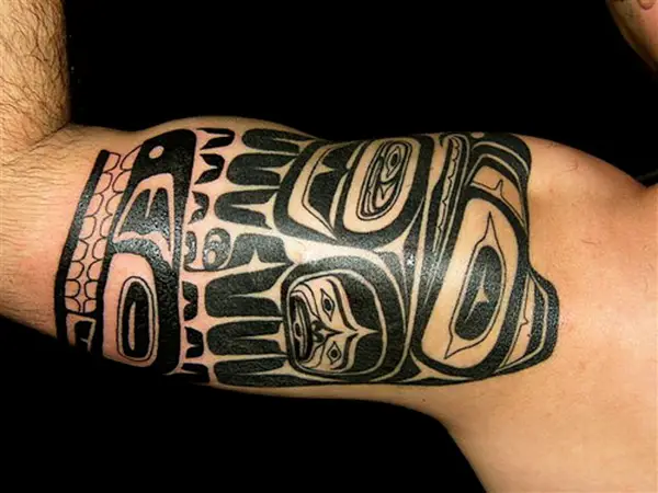 Shoulder Totem Pole Tattoo