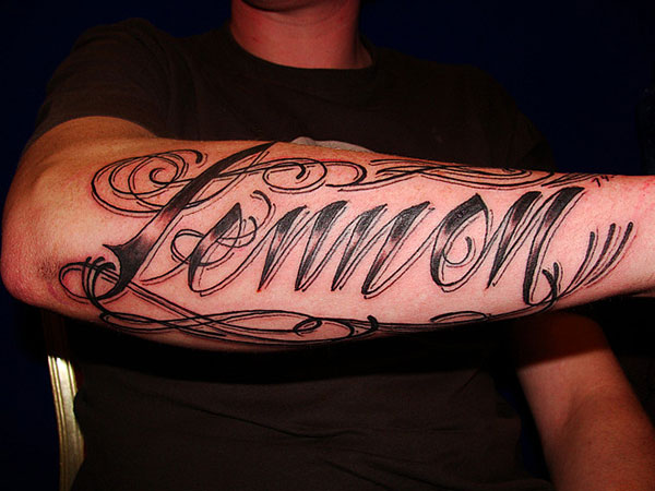 Lennon Tribute Arm Tattoo