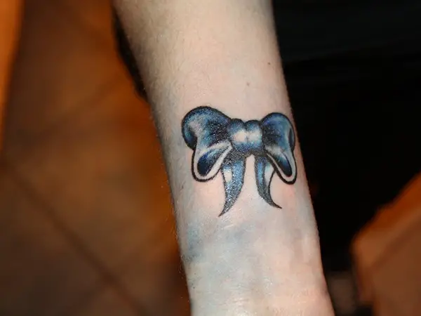 Black Blue Bow Tattoo