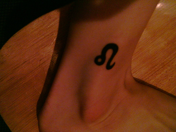Woman's Leo Foot Tattoo