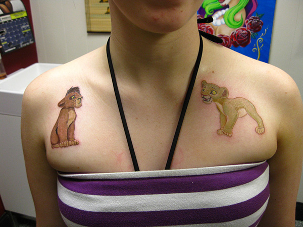 Simba, the Lion King is tattooed very artistically with his twin Samba. 