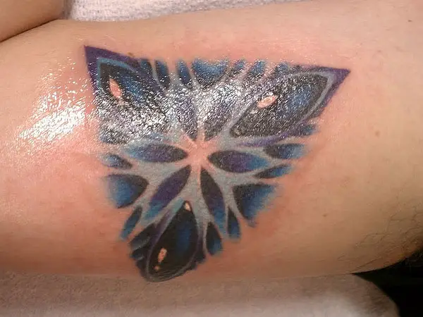 Pretty Floral Triangle Tattoo