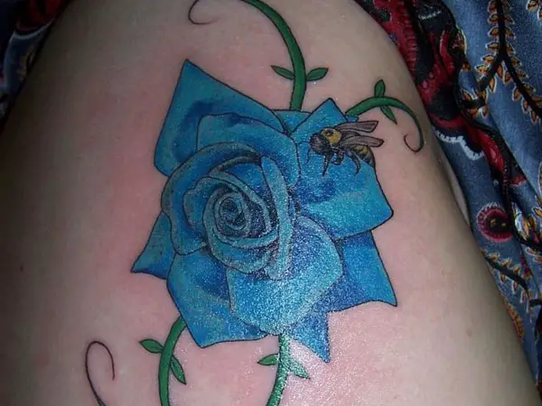 Tattoo uploaded by Adventure tattoo studios 2  Beautiful red rose and  butterfly by Sean at wwwadventuretattooscom inkedadventure  wwwadventuretattooscom femaletattoo butterflytattoo roseandbutterfly  thightattoo bluebutterfly rose redrose 