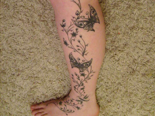 Leg Tattoos (For Women) - Examples with Photos - Design Press