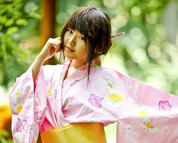 Side View Of Young Chinese Woman With Short Hair Posing On The White  Background Isolated Stock Photo Picture And Royalty Free Image Image  141154988