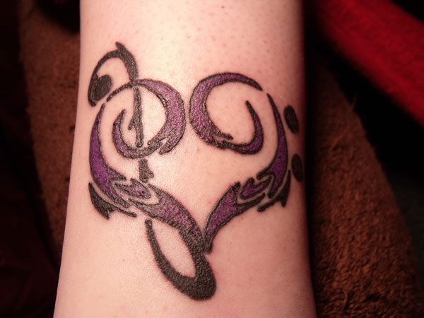 23 Arresting Tribal Heart Tattoos