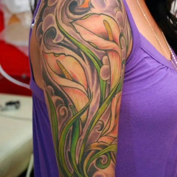 Magnolia and Lily of the Valley Tattoo