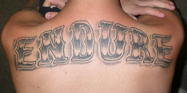 Strong Lettering Tattoo