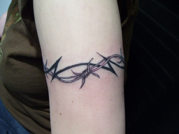 barb wire cover up tattoo