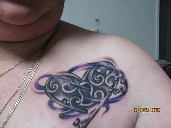 Black And Purple Heart Locket Tattoo