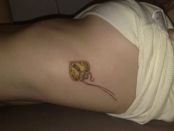 Golden Heart Locket Tattoo