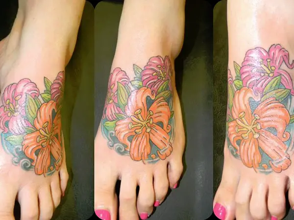 Girl Hibiscus Flowers Tattoo On Left Foot