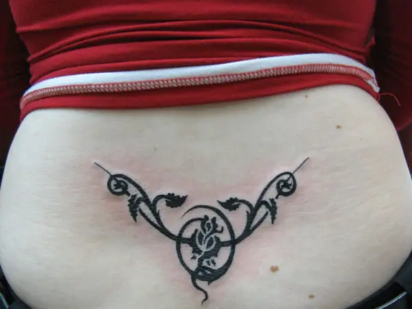 28 Eye Catching Lower Back Tattoo Designs - SloDive