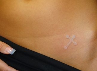 23 Fierce White Ink Tattoos On Black People