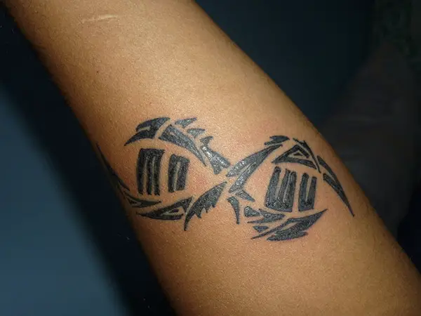 Tribal Theme Tattoo