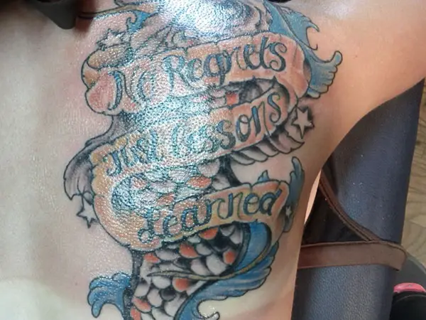 Gay pronstar with koi tattoo