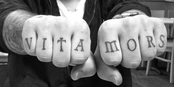 Latin Knuckle Tattoo