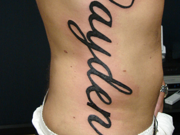 cool tattoos on ribs for guys